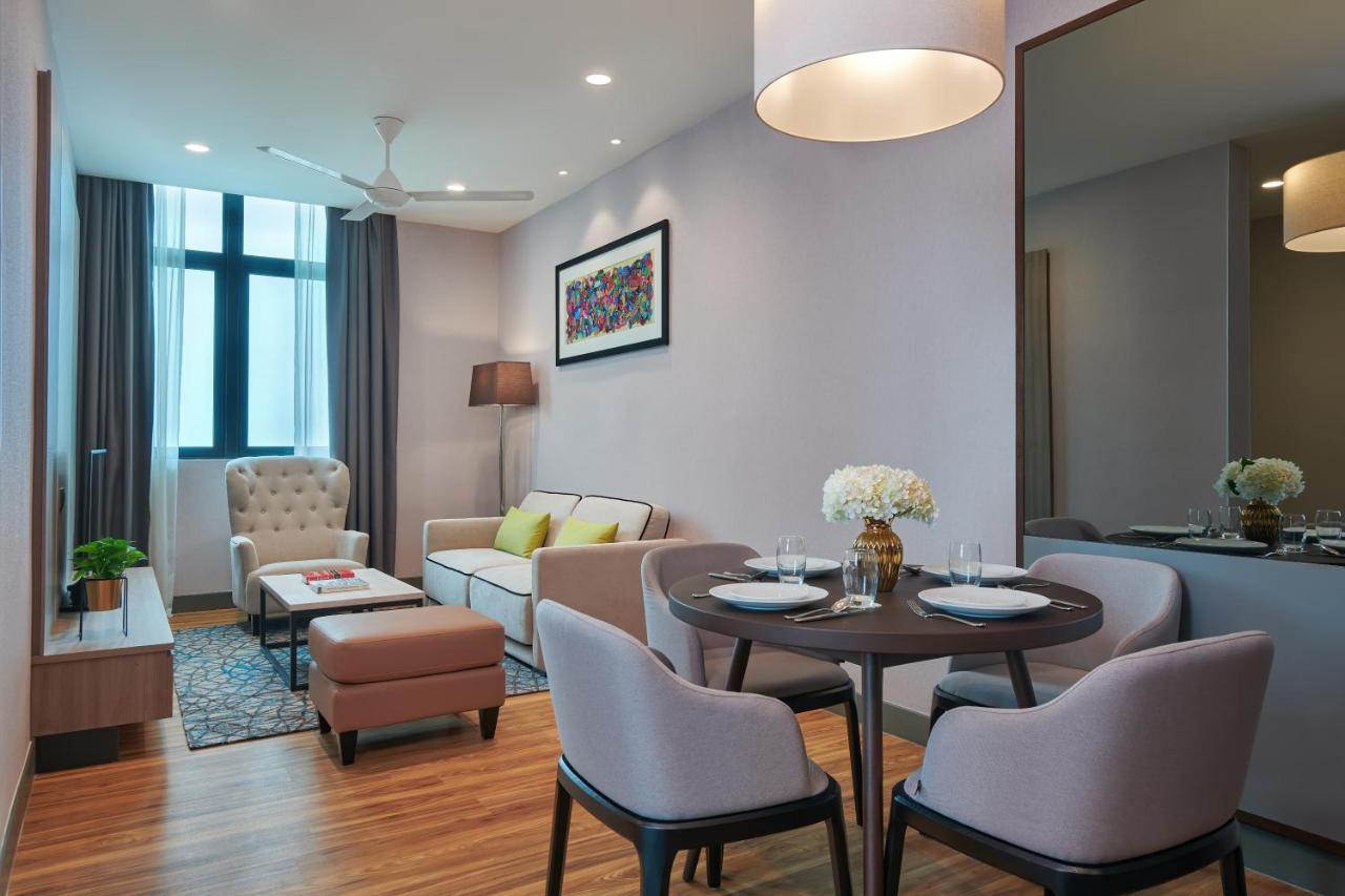 Mercure Living Putrajaya Exterior photo A typical living room in a serviced apartment