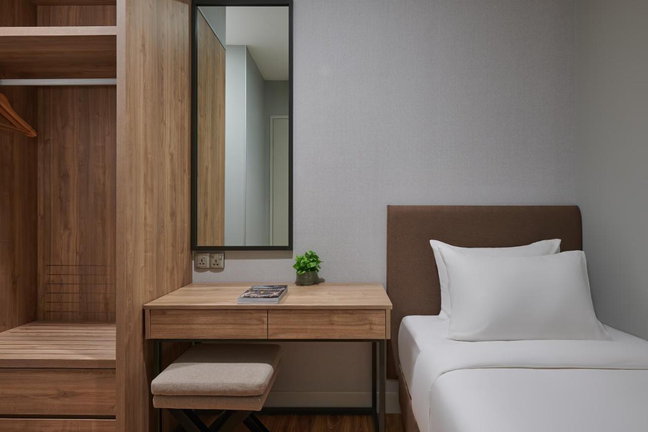 Mercure Living Putrajaya Exterior photo A bedroom at the hotel