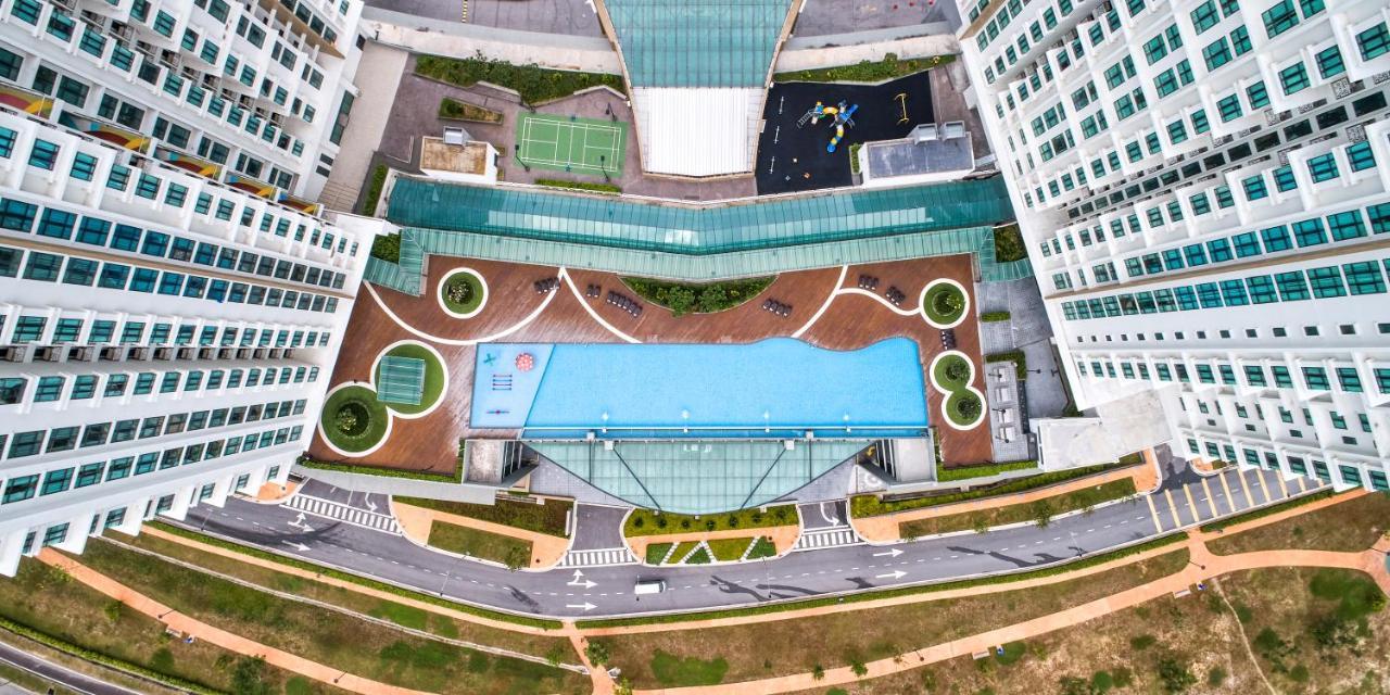 Mercure Living Putrajaya Exterior photo Aerial view of the pool