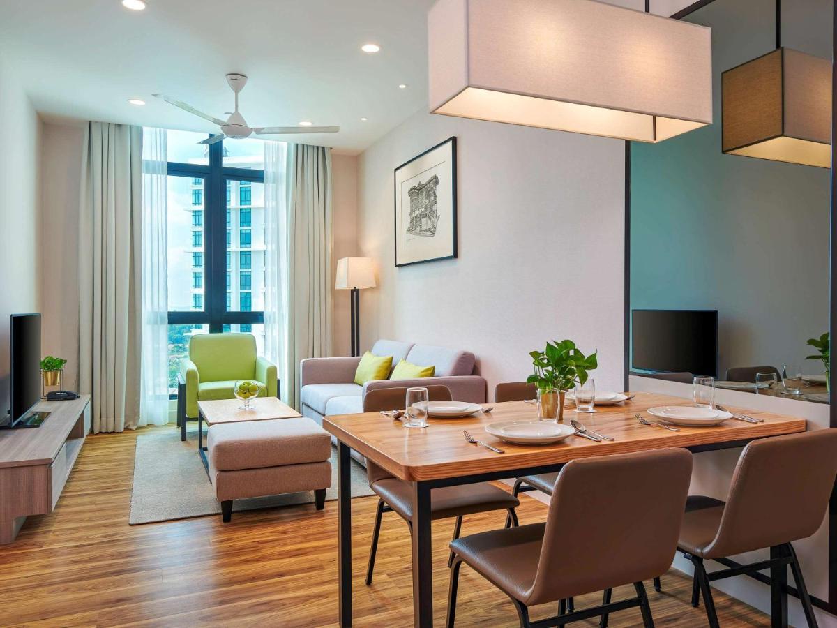 Mercure Living Putrajaya Exterior photo A typical living room of a serviced apartment in Kuala Lumpur, Malaysia.